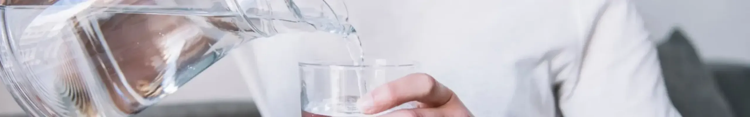 Women pouring water