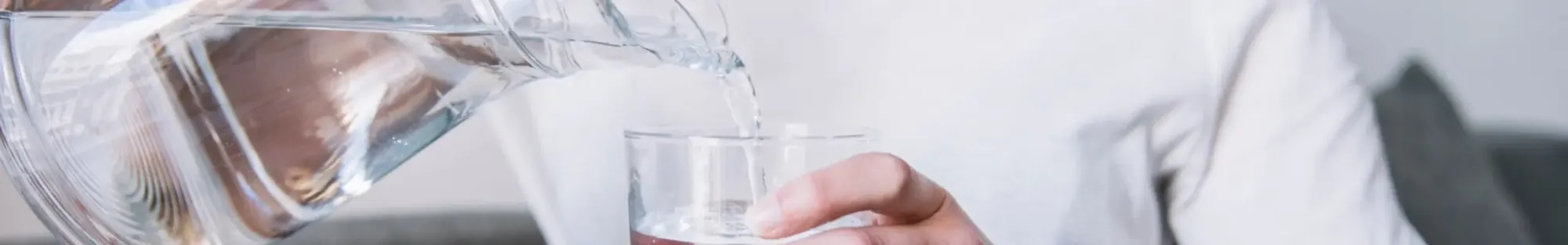 Woman pouring water